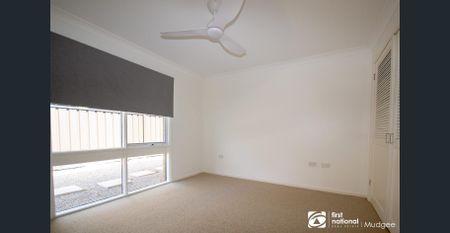 Stylish Family Home Backing onto Reserve - Photo 4