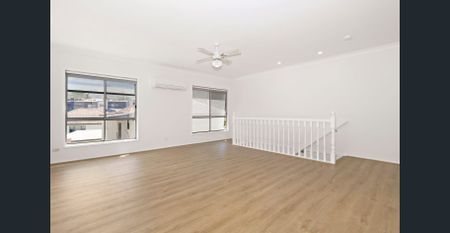 Four-bedroom house - Photo 5