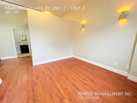 NEWLY RENOVATED 1-BEDROOM/1-BATH MAIN FLOOR SUITE +HYDRO - Photo 4