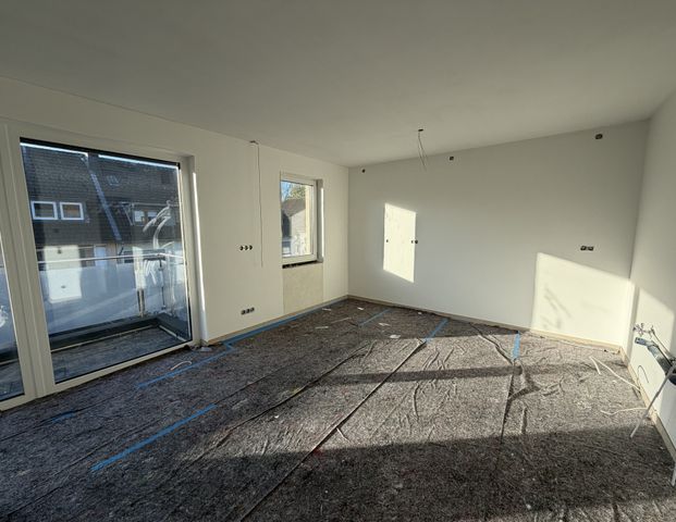 *Barrierefrei Wohnen in Rheinnähe* Erstbezug, Balkon und Einbauküche! - Foto 1