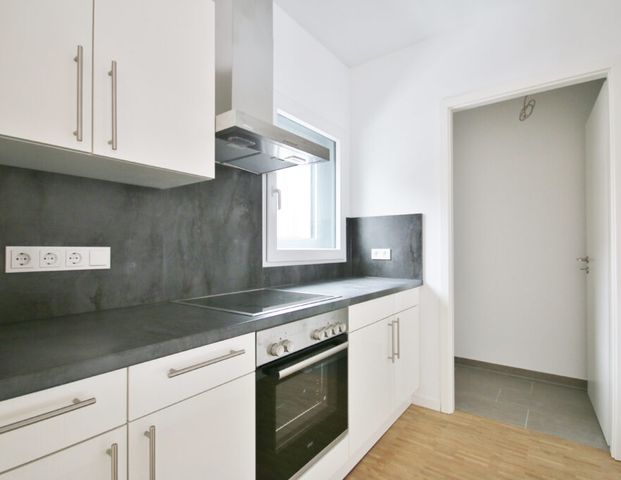 Moderne 3-Zimmer-Wohnung mit Wasserblick - Foto 1