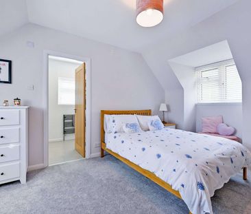 A beautifully refurbished three-bedroom detached home in the sought... - Photo 2