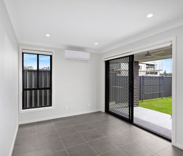 Beautiful Built Home with Alfresco Living! - Photo 1