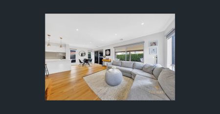 Spacious 4-Bedroom Home with Multiple Living Zones - Photo 2