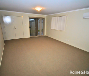 Spacious Family Duplex with Modern Comforts - Photo 1