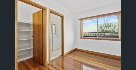 Modern 3-Bedroom Home in Great Location - Photo 2