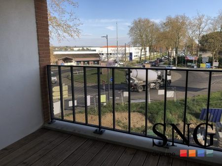 T3 AVEC LOGGIA ET DEUX PARKINGS COUVERTS - Photo 5