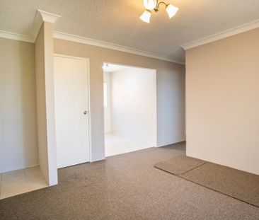 Light Filled Unit in Ideal Location - Photo 2