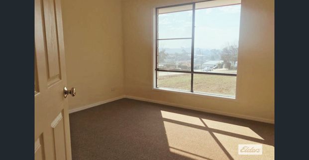 Practical 4-Bedroom Brick Home - Photo 1