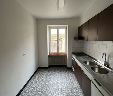 Court, joli 3 pièces avec jardin commun situé dans un quartier calme - Photo 1