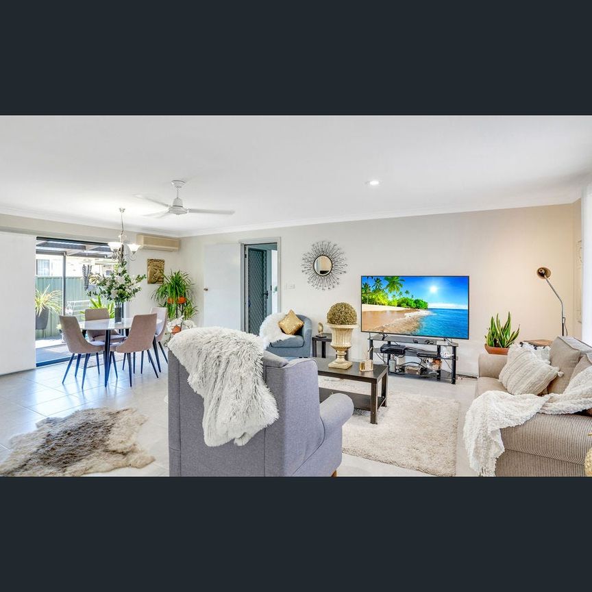 Easy-Care Living with Outdoor Charm - Photo 1