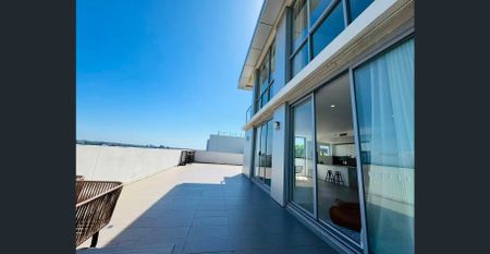 Fully furnished | Rare Three-Bedroom Penthouse with Iconic Views- An Oversized Layout Seldom Found - Photo 5