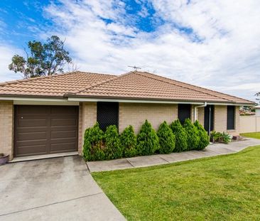 Modern 3 Bedroom Family Home with Ducted Air Conditioning - Photo 4