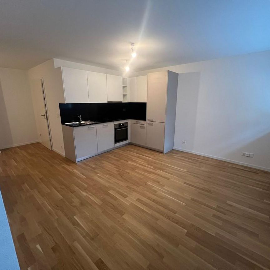Joli 2.5 pièces en duplex au 4ème étage dans un immeuble moderne et calme, proche de de la gare et des centres commerciaux. - Foto 1