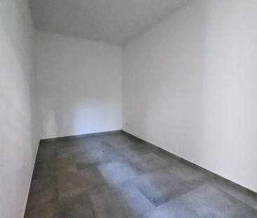 Gemütliche Souterrain-Wohnung mit Terrasse, Einbauküche und Fußbode... - Photo 1