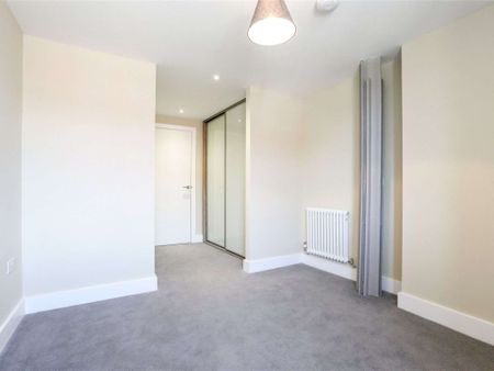 A two bedroom apartment with off street parking. - Photo 2