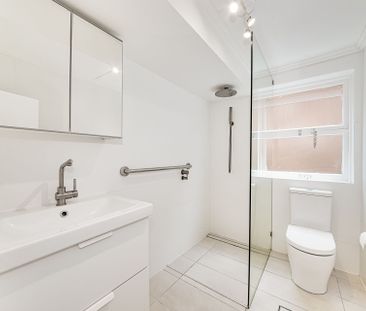 Renovated Two Bedroom Duplex in Convenient Location - Photo 4