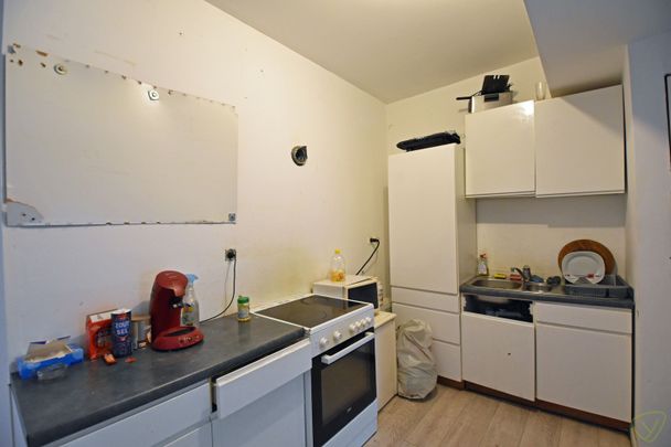 Ruim appartement gelegen op de Markt van Eeklo! - Photo 1