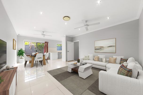 Air-Conditioned Four-Bedroom Single-Level Duplex with Gas Cook-Top and Dingle Garage! - Photo 1