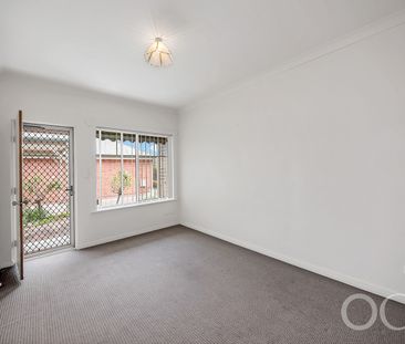 Open the Door To Light-Filled Living in a Peaceful Parkside Setting - Photo 2