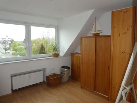 Hübsche 2-Zimmer-Dachgeschoss-Wohnung im Herzen von Asberg - Photo 2