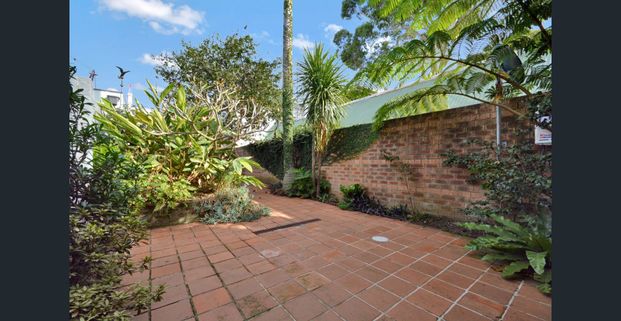 CHARMING QUAD-LEVELLED OPEN PLAN TERRACE WITH GARAGING - Photo 1