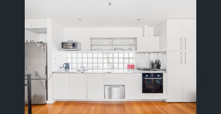 Fully Furnished- Contemporary warehouse spread over three impressive levels in a boutique block. - Photo 3