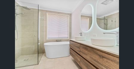 Beautifully presented 4-bedroom home - Photo 5