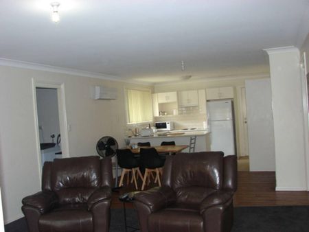 BEAUTIFULLY APPOINTED AND FULLY FURNISHED TWO (2x) BEDROOM FREE STANDING MODERN BRICK DWELLING WITH GARAGE - Photo 3