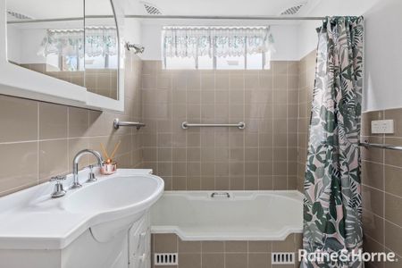 Well-Maintained Apartment With Light-Filled Living and Strong Investment Appeal - Photo 4