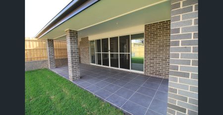 Chic 4-Bedroom Family Home in Prime Marsden Park Location - Photo 5