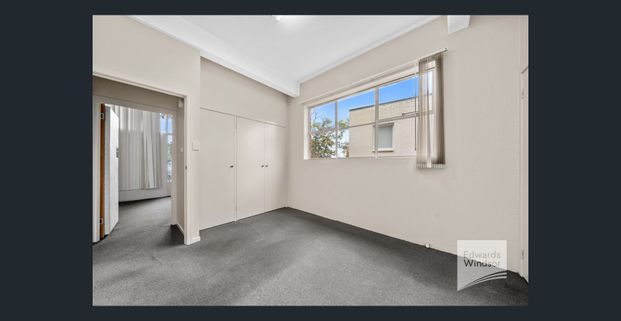 Charming Two Bedroom Apartment in a Prime Location! - Photo 1