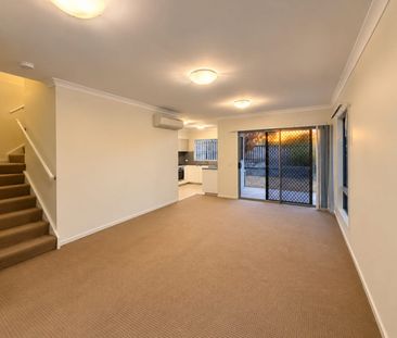 LOW-MAINTENANCE LIVING WITH A POOL AT YOUR DOORSTEP! - Photo 2