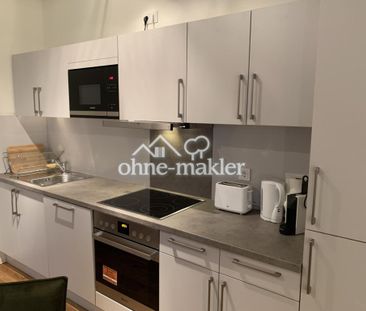 Komfortables Apartment mit Großstadtflair 1.11 - Photo 4