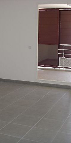 Location Appartement 2 pièces 43m² ST DENIS 97400 - Photo 1