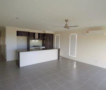 “Four Bedroom Family Home” - Photo 2