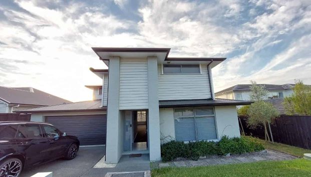 Spacious family Home in Millwater - Photo 1