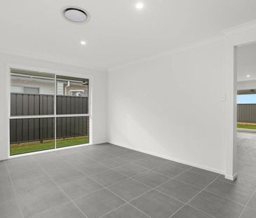 BRAND NEW 4- BEDROOM FAMILY HOME- COMFORT, STYLE & LOCATION! - Photo 4
