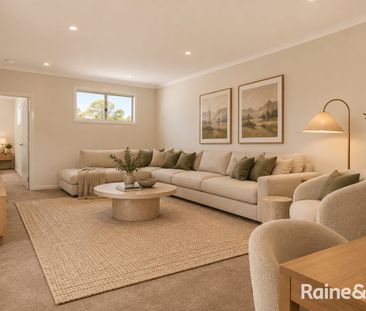 Spacious Three-Bedroom Home with Multiple Living Areas - Photo 1