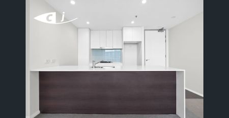 A spacious 1 bedroom with North Aspect and water views from all rooms - Photo 3