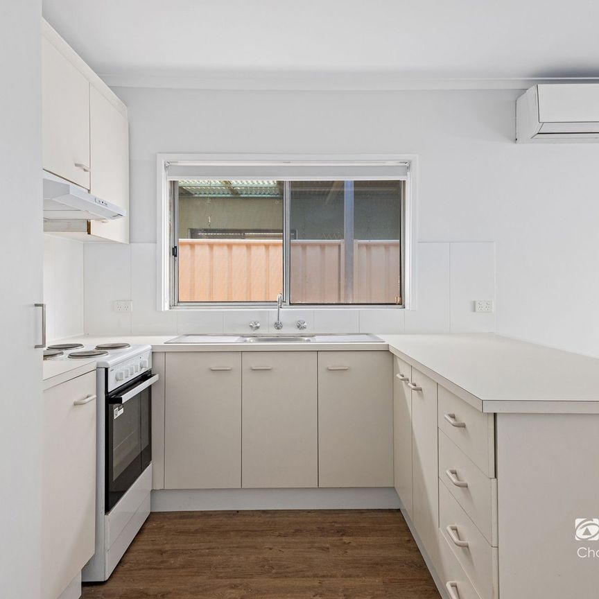 Low-Maintenance Unit Close to Town - Photo 1