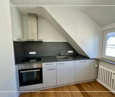 Sanierte 3-Zimmer-DG-Wohnung mit Cabriofenster und stilvoller Einba... - Foto 1