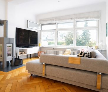 Exklusives Wohnen in Hochparterre mit Kamin und eigenem Garten auf ... - Foto 1