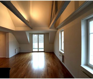 Moderne 2.5-Zimmer-Dachwohnung in Bahnhofsnähe mit hochwertigem Inn... - Photo 1