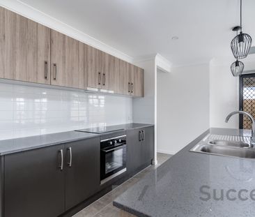 Modern Family Living with Multiple Living Areas in Convenient Glenv... - Photo 6