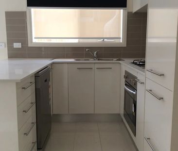 Register to Inspect // Stylish Two-Bedroom Townhouse with Dual Livi... - Photo 5