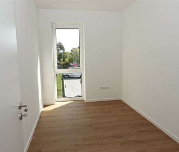 Moderne Neubauwohnung in guter Lage von Schortens! - Foto 4