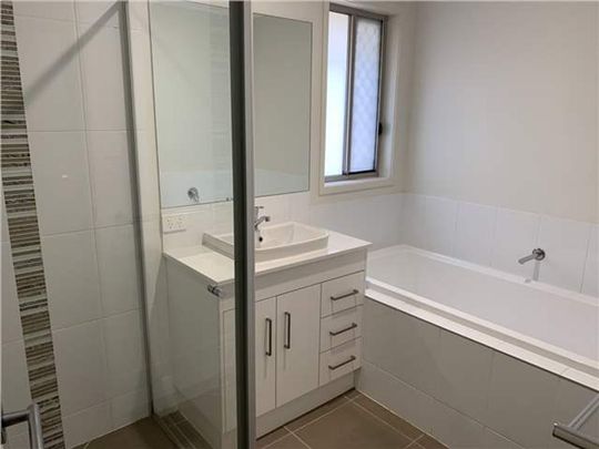 A stylish, easy-care home ready for you! - Photo 1