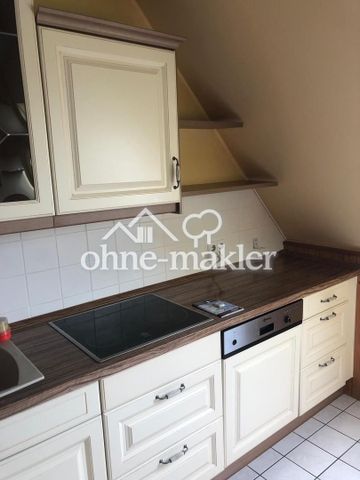 Sonnige 4-Zimmer-DG-Wohnung mit großem Südbalkon, Keller und Garage - Foto 3