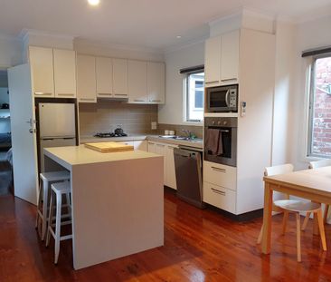 Partly Furnished 2-Bedroom Unit in the Heart of Newtown - Photo 5